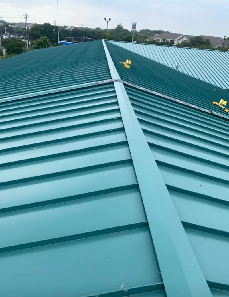 Green commercial metal roof ridge and valley for Metal Roof Repair in Burbank
